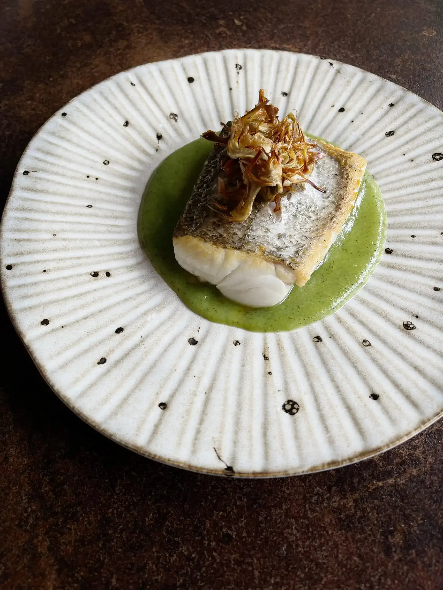 fish dish with green sauce - hotel roc blanc