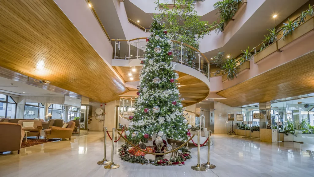 christmas tree in lobby of the hotel - roc blanc hotel & spa andorra