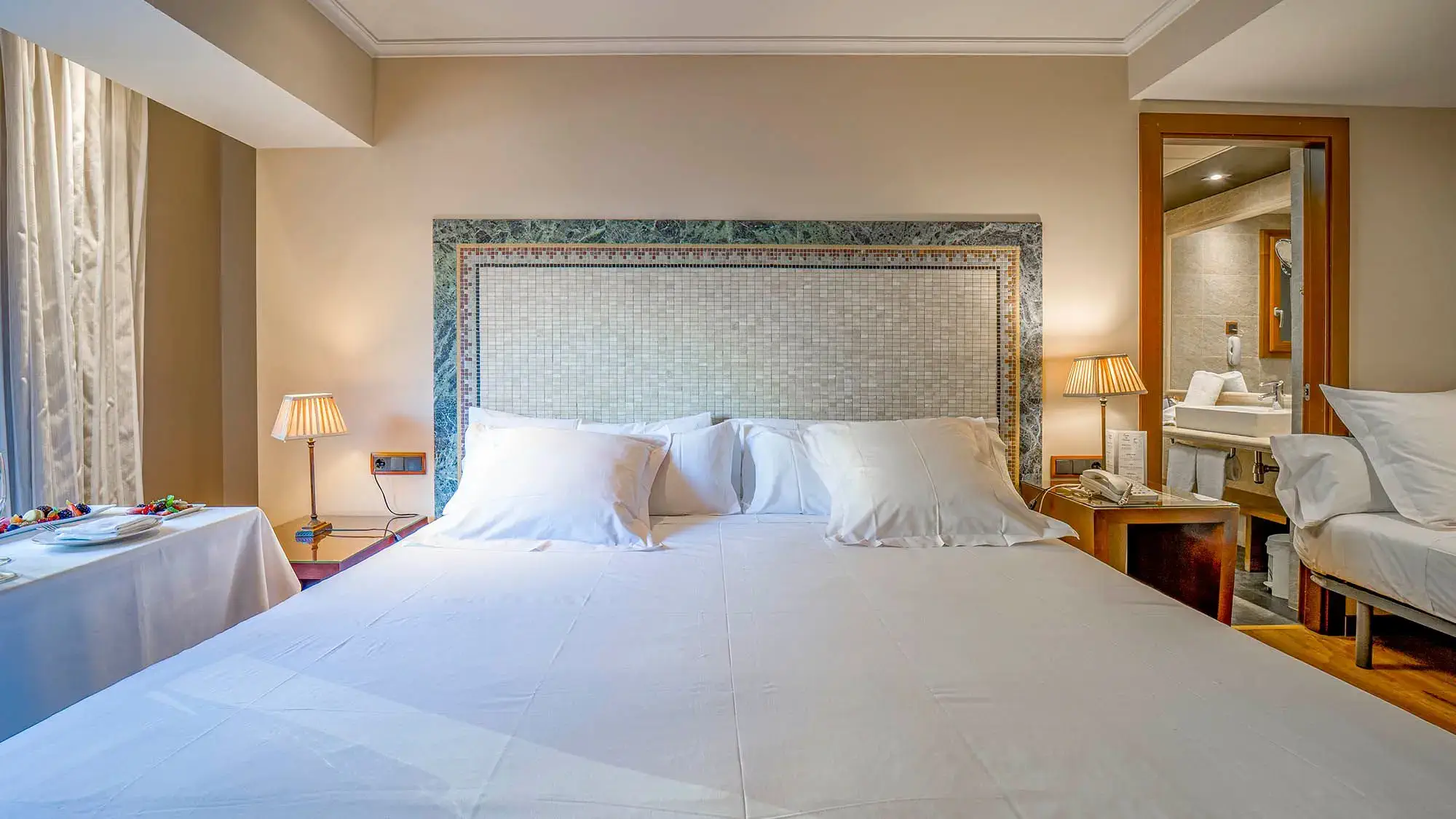 double room with double bed and extra single bed - deluxe room- roc blanc hotel & spa andorra