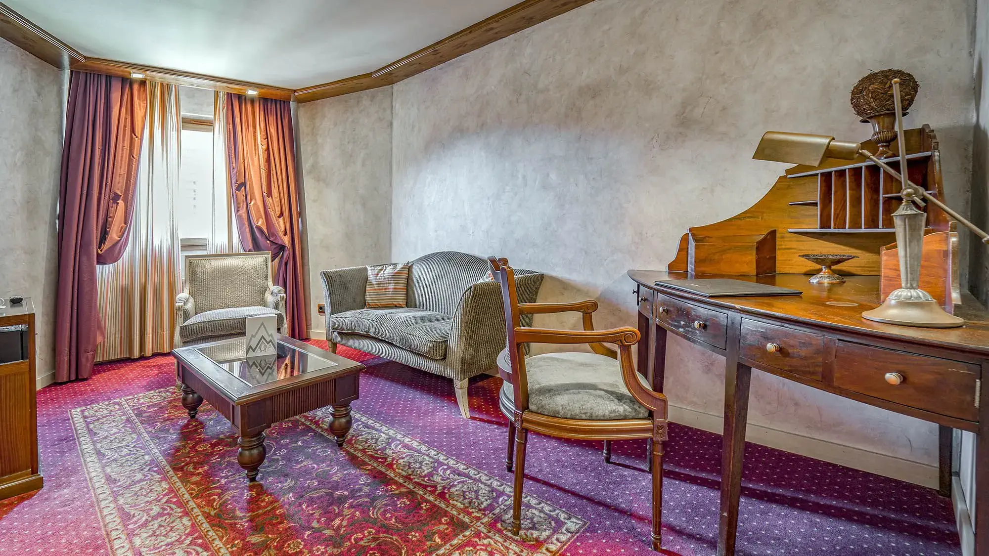 luxurious sitting area in hotel room - suite- roc blanc hotel & spa andorra